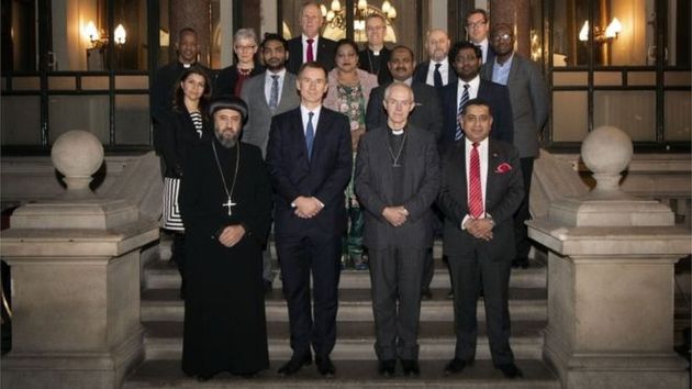 Foreign Secretary Jeremy Hunt and the Archbishop of Canterbury Justin Welby with survivors of Christian persecution. / gov.uk ,