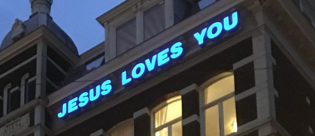 When visitors to Amsterdam step out of the Central Railway Station, they are greeted with the words Jesus loves you.,