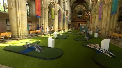 The Rochester Cathedral opened up a nine-hole mini-golf course down the center aisle. / Rochester Catheral.