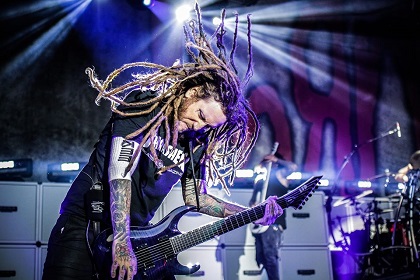 Playing during a live show. / Facebook Brian Head Welch