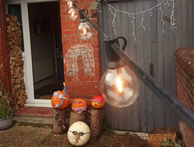 We’ve covered the front of our house in fairy lights. / Photo: Nay Dawson,