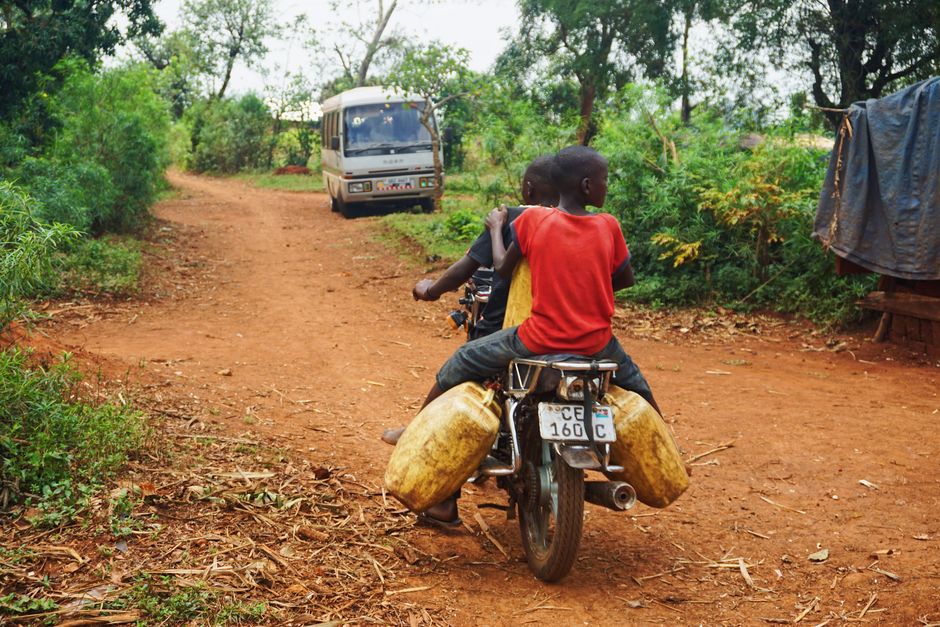 It is very common to see Ugandan children riding motocycles in rural areas. /  <a target="_blank" href="https://unsplash.com/@melissaaskew">Melissa Askew</a>, Unsplash CC0.,