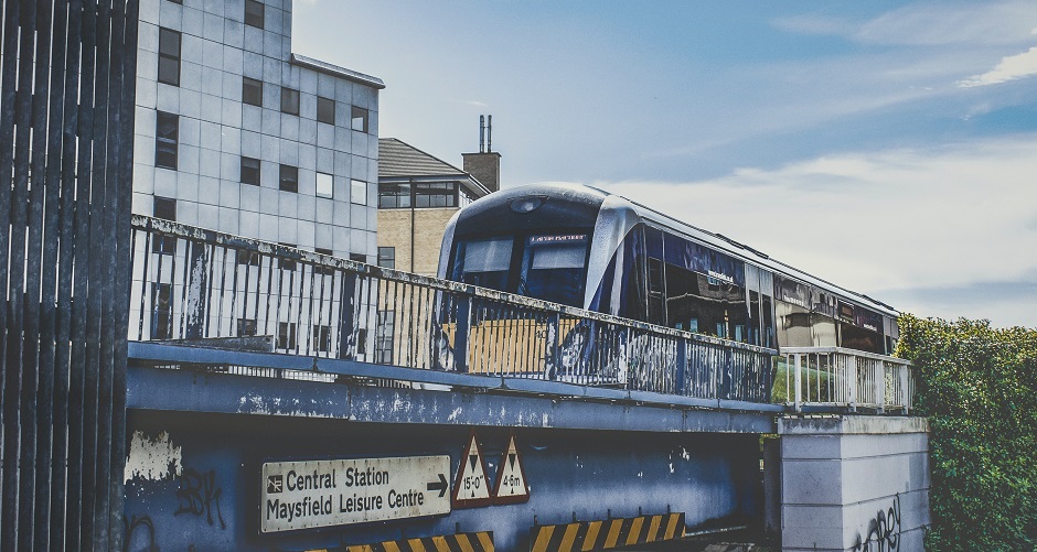 A commuter train leaving Lanyon Place Station in Belfast, Northern Ireland. / Photo: <a target="_blank" href="https://unsplash.com/@kmitchhodge">K. Mitch Hodge</a>,