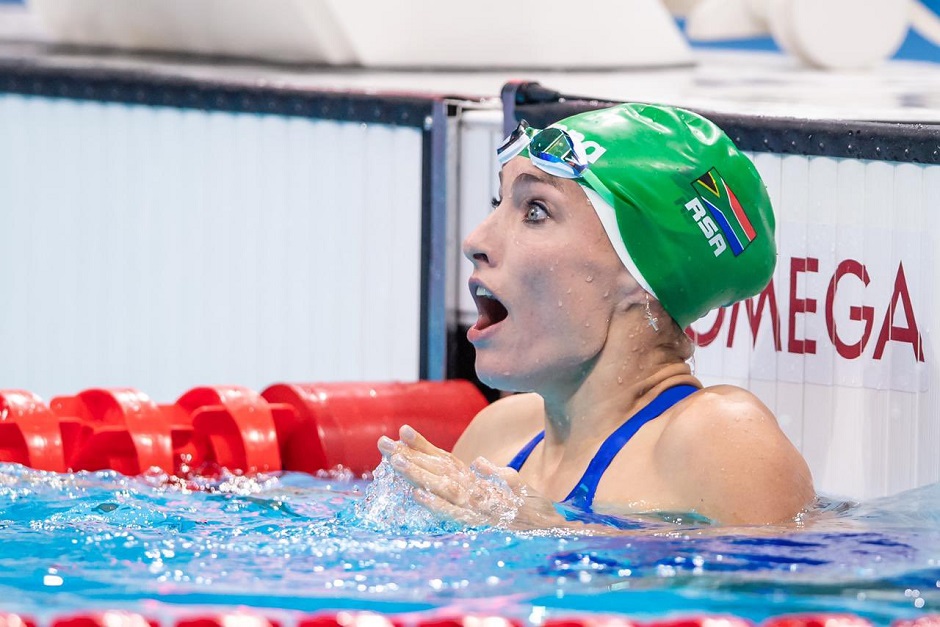 Tatjana Shoenmaker, as she realises she has beaten the 200m breaststroke World Record, at the Tokyo 2020 Olympic Games. / Photo via <a target="_blank" href="[link]">Twitter Team South Africa</a>.,