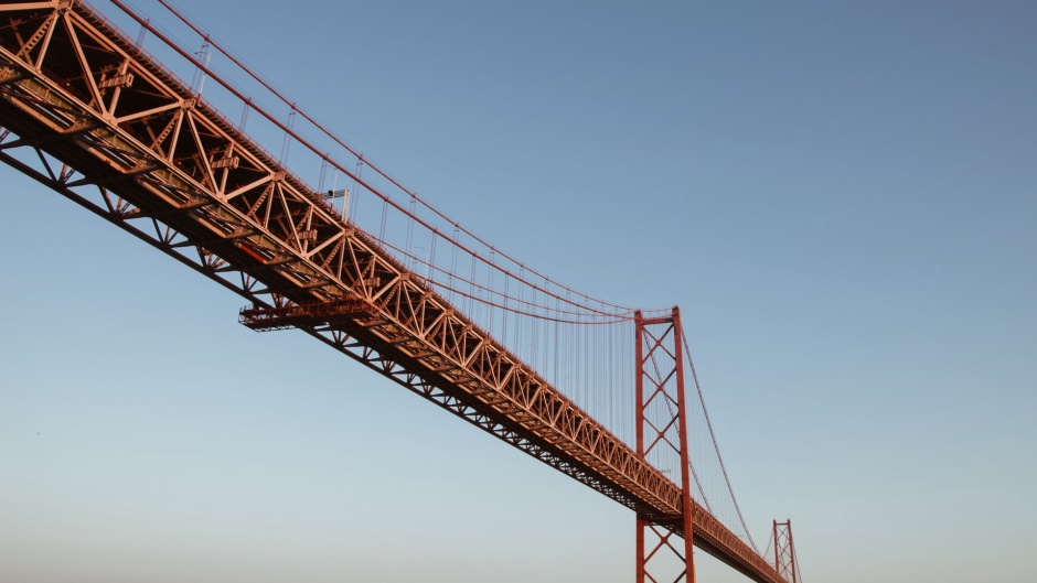 A bridge in Lisbon, Portugal. / <a target="_blank" href="https://unsplash.com/@annakazaky">Hanna Kazak</a>, Unsplash, CC0.,