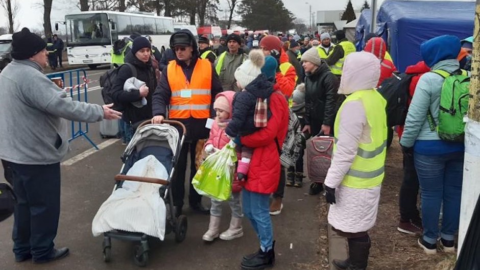 Ukrainian refugees at customs at the Romanian border near Suceava / Biserica Bethel.,
