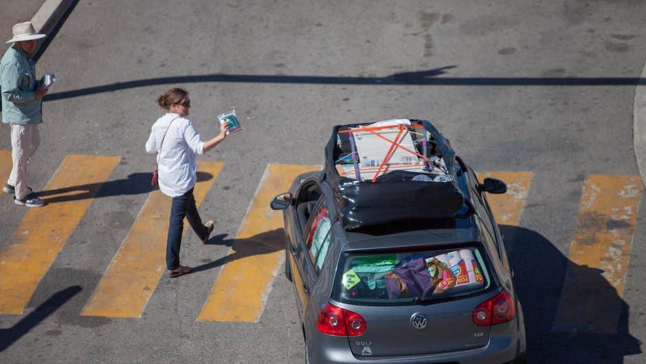 Operation Transit volunteers handing out Bibles and other Christian materials at a port in southern Europe / OPTransit.,