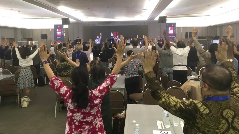 Praying blessing on the peoples of Asia, during Asia2022 conference in Bangkok. / Photos: Jim Memory. ,
