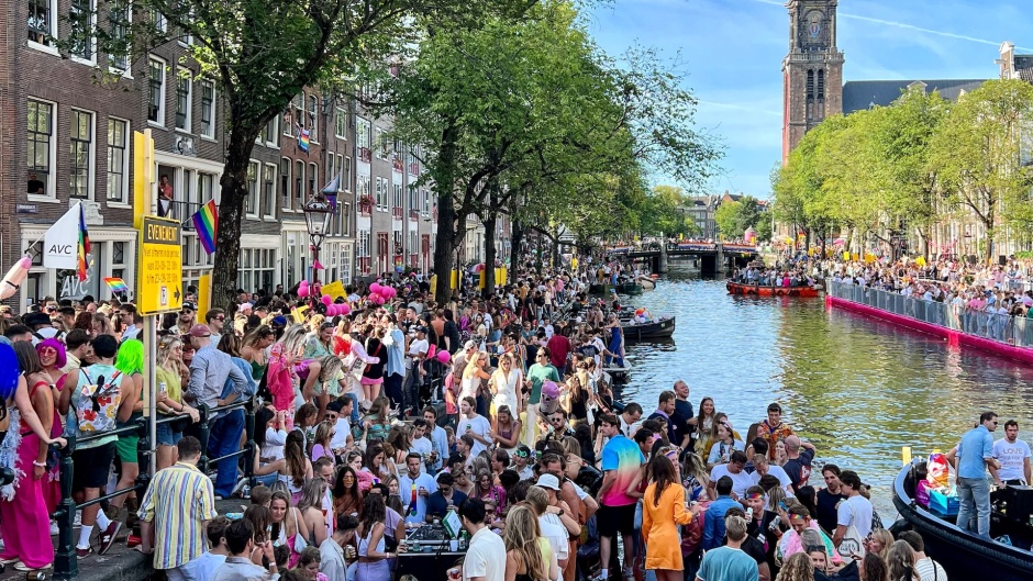 A LGBT Pride parade in Amsterdam, Netherlands. / Photo: <a target="_blank" href="https://unsplash.com/@amirdeljuyi">Amir Deljouyi</a>, Unsplash, CC0.,