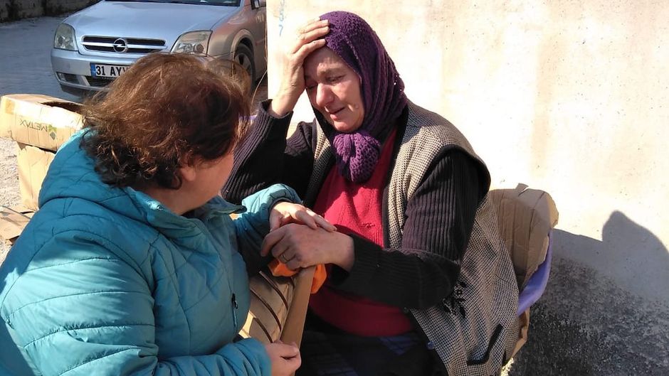 Debora, a Christian in Turkey, comforts a woman on the streets of Antioch.,