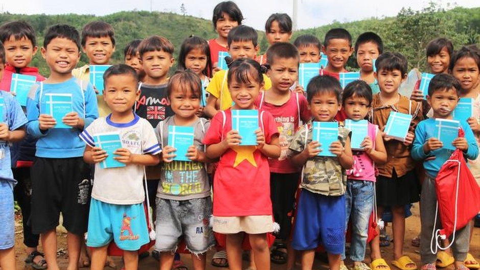 Children at a distribution campaign in Vietnam / Photo: <a target="_blank" href="https://unitedbiblesocieties.org/">United Bible Societies.</a>,