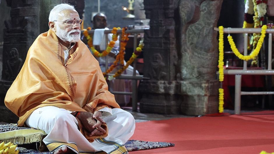 Prime Minister Narendra Modi celebrating the inauguration of a temple.. / <a target="_blank" href="https://commons.wikimedia.org/wiki/Category:Narendra_Modi_in_2024#/media/File:Prime_Minister_Modi_at_Veerbhadra_Temple.jpg">Prime Minister's Office </a>, Wikimedia Commons.,