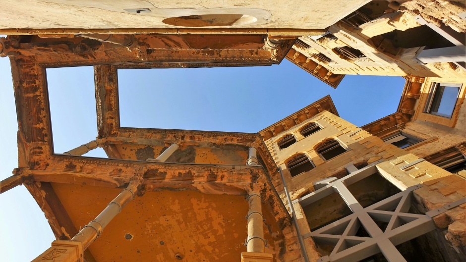 'The Yellow House' ('La Maison Jaune') was the demarcation line between East and West Beirut during the civil war and changed hands between military factions often. / Photo: <a target="_blank" href="https://unsplash.com/@timbrofrance">Tim Broadbent</a>, Unsplash, CC0.,