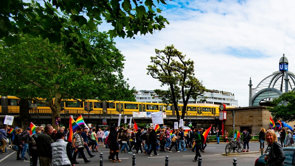 An LGBTQI march in Berlin, Germany. / Photo: <a target="_blank" href="https://unsplash.com/@snapdb">D. Braithwate</a>.,