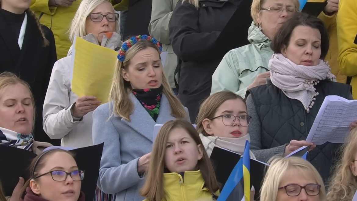 A woman cleans and cries in Ukraine