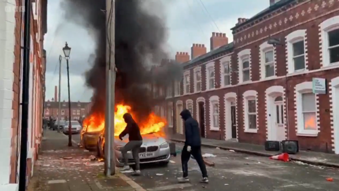 A car is on fire on a street in Belfast on 9 June 2026. / Image: <a target="_blank" href="https://www.bbc.com/">BBC</a>.,