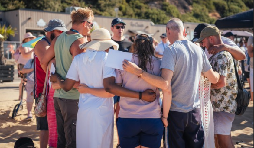 Around 2,700 attend mass baptisms on Bournemouth beach