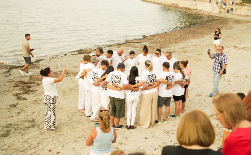 A church in Denia has been baptising in the Mediterranean for 105 years