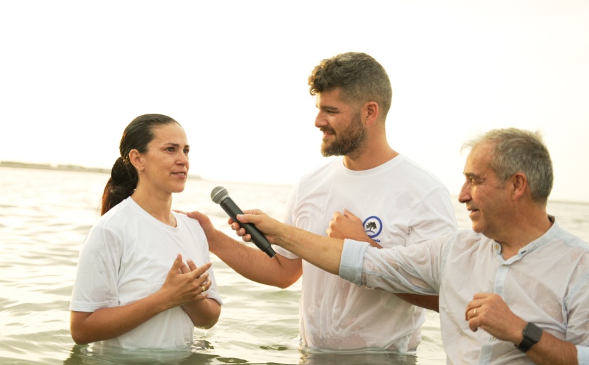 A church in Denia has been baptising in the Mediterranean for 105 years