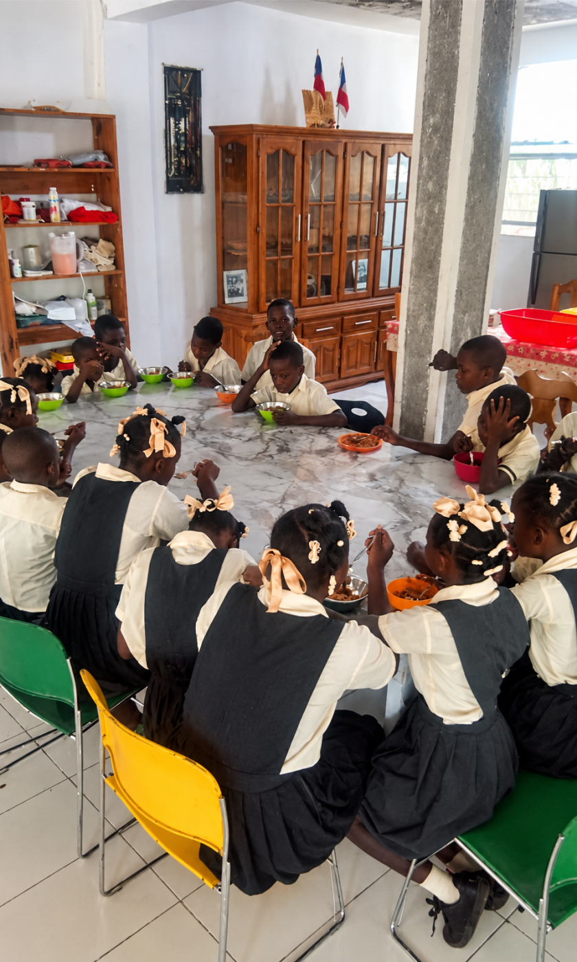 Chickens, a school canteen, and a social enterprise in Haiti